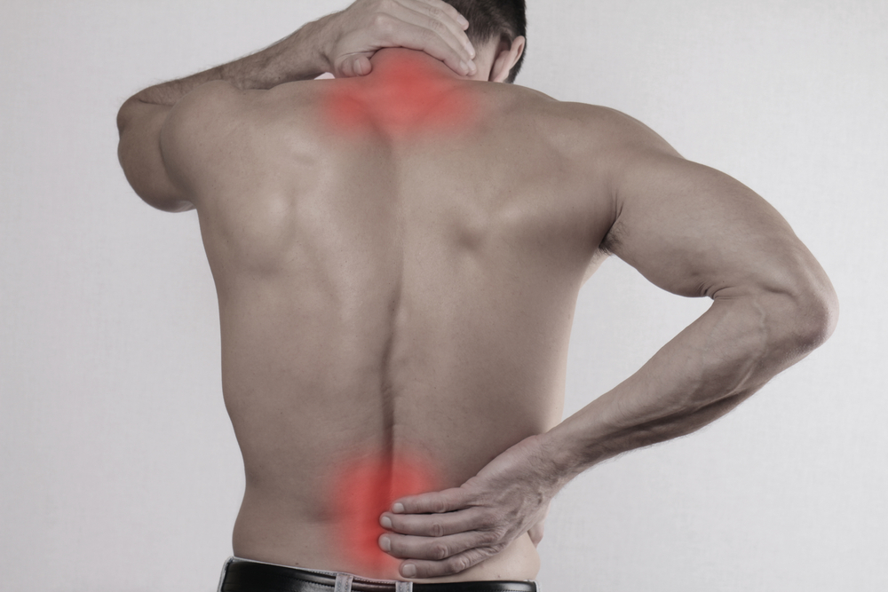 man with neck and back pain