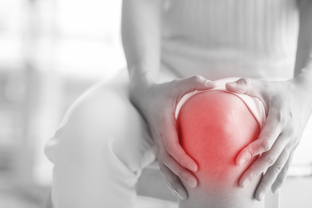 woman knee pain joint injections pain relief