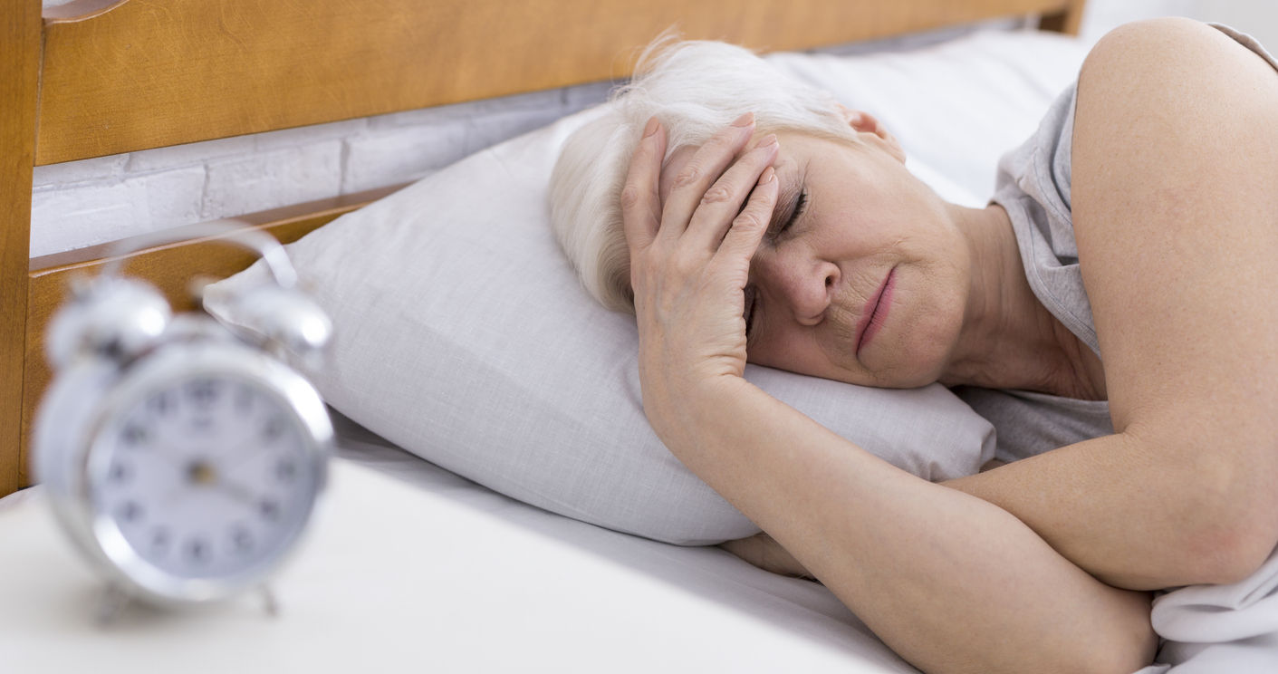 woman with pain and insomnia